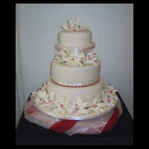 Three Tier White Lillies Cake