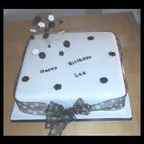 Black Ribbon and Flowers Cake
