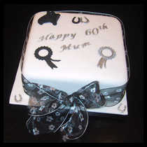 60th Birthday Horseshoes Black Ribbon Cake